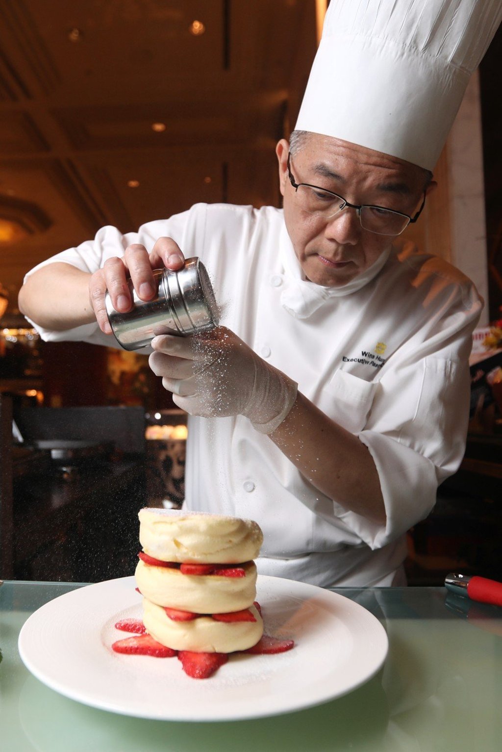 Pastry chef Wins Hung Chi-yin makes a Birthday Tower from soufflé pancakes. Photo: Xiaomei Chen