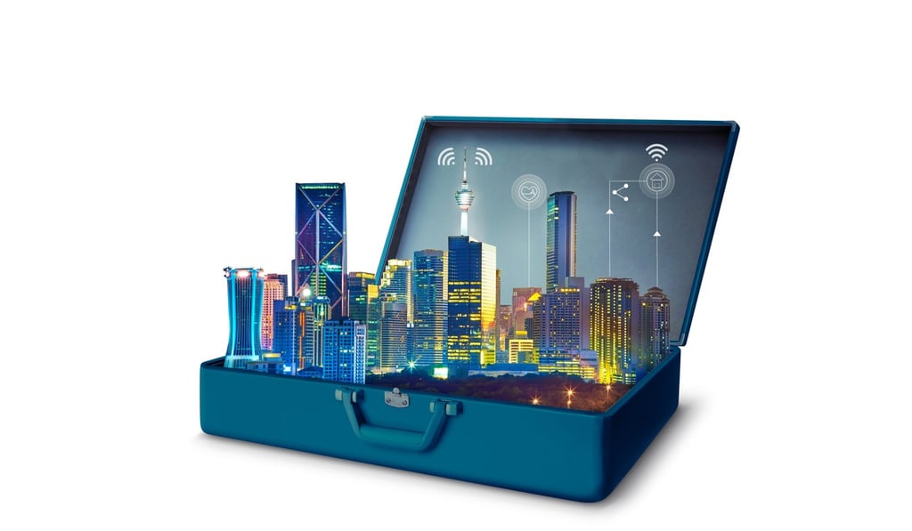 Smart city with smart services and icons, internet of things, networks in an open retro vintage suitcase isolated on blue background. Photo: Shutterstock