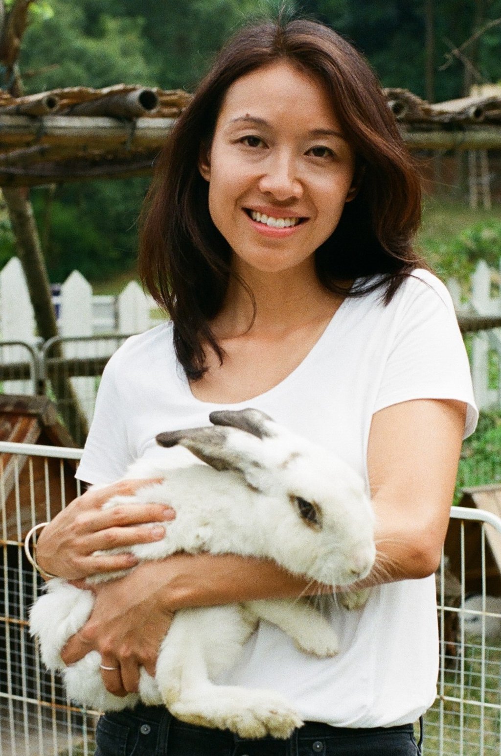 Justine Kwok, founder of Flow, the experiential farm and animal sanctuary in Zhongshan, with one of the rabbits under her care. Photo: Abdela Igmirien Justine Kwok, founder of Flow, the experiential farm and animal sanctuary in Zhongshan, with one of the rabbits under her care. Photo: Abdela Igmirien