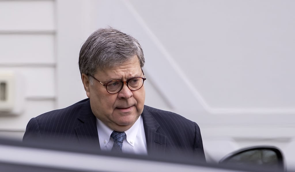 US Attorney General William Barr leaves his home in McLean. Photo: EPA