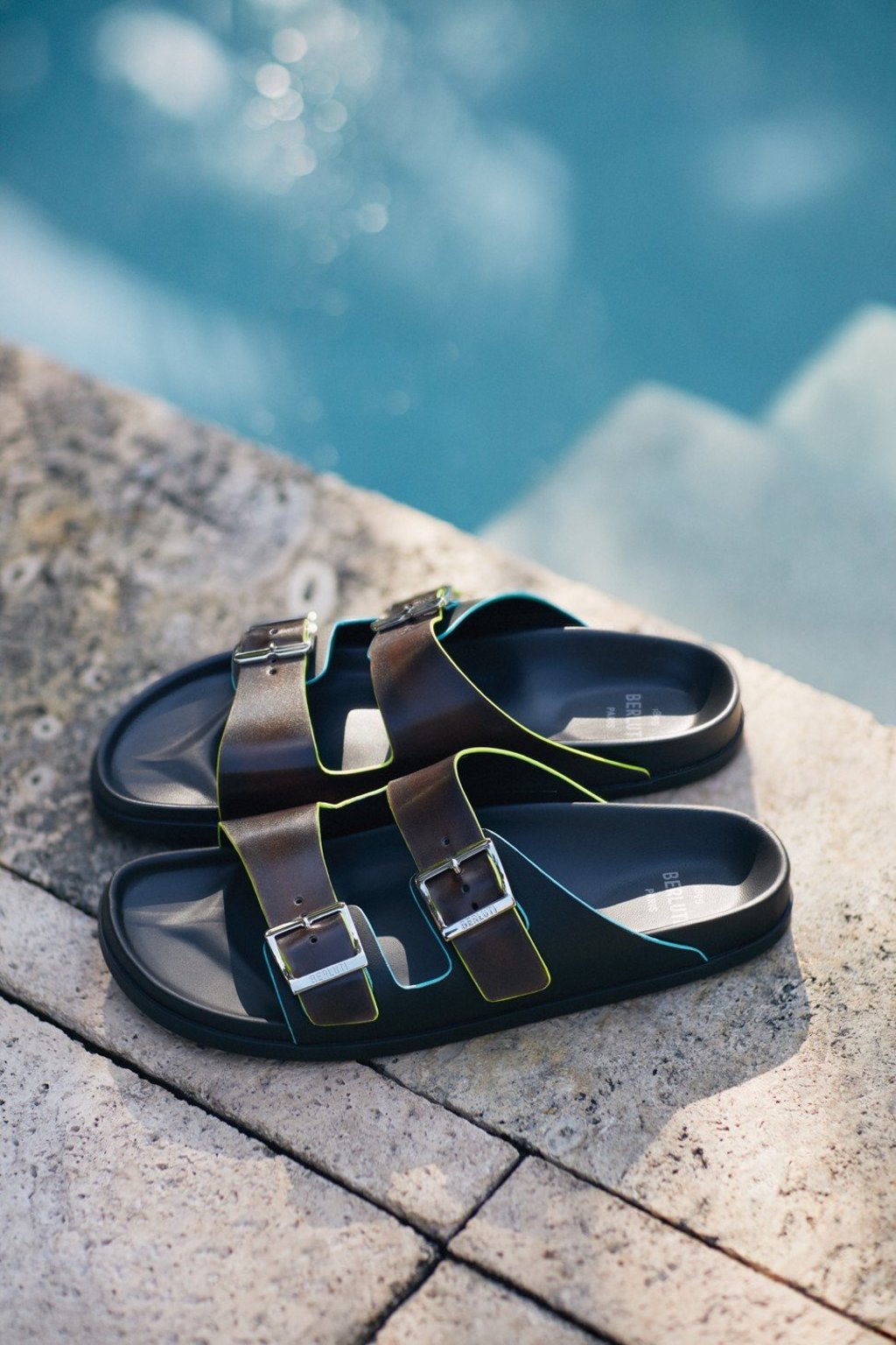 A pair of Egio Sandals from the summer 2019 capsule collection of Berluti, the luxury shoe, ready-to-wear and leather goods maker. A pair of Egio Sandals from the summer 2019 capsule collection of Berluti, the luxury shoe, ready-to-wear and leather goods maker.
