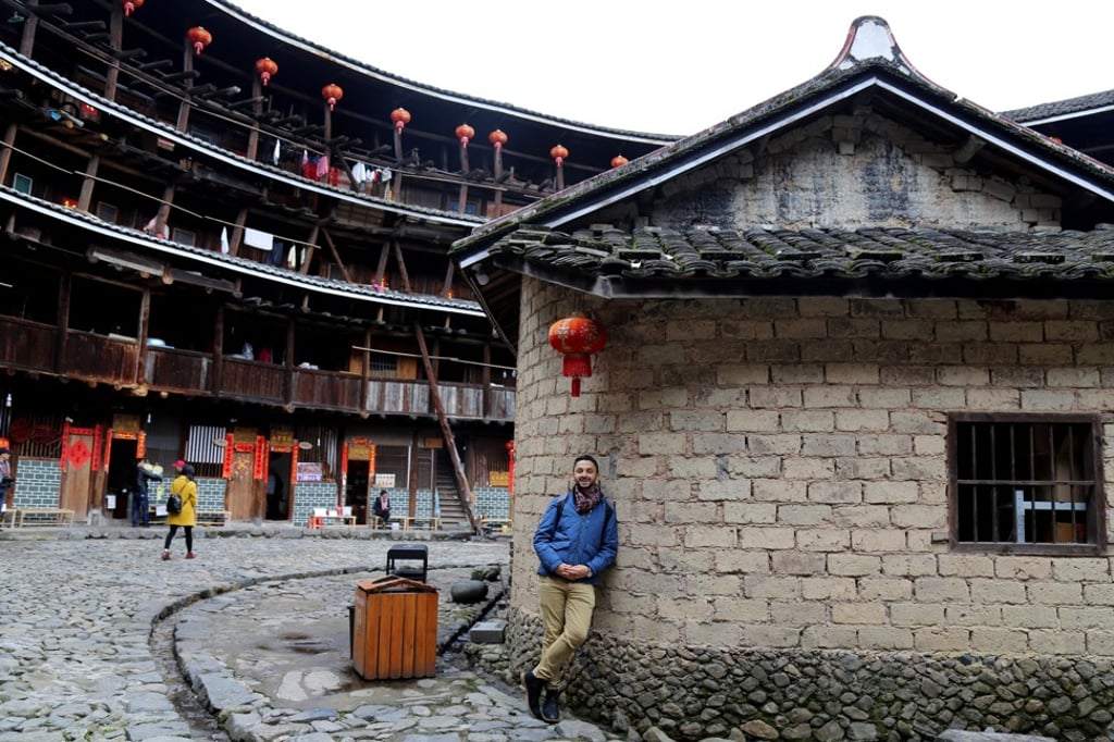 Herszberg at a Hakka roundhouse in China’s Fujian province.