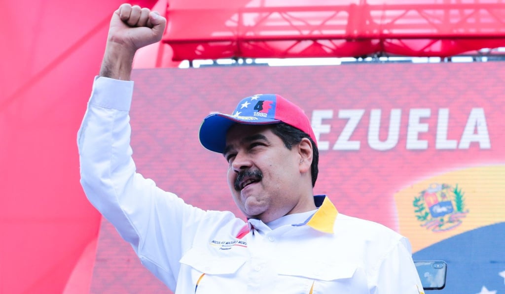 Venezuelan President Nicolas Maduro welcomes supporters participating in an “anti-imperialist” protest in Caracas on March 23. Photo: EPA-EFE via handout