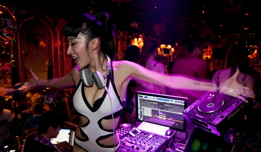 A DJ arouses the crowd at a nightclub in China. A woman’s hormones and neurotransmitters need to be in harmony to her to function sexually, and feeling desired is an important turn-on for many women, psychologist Dr Kristin Zeising says. Photo: Alamy A DJ arouses the crowd at a nightclub in China. A woman’s hormones and neurotransmitters need to be in harmony to her to function sexually, and feeling desired is an important turn-on for many women, psychologist Dr Kristin Zeising says. Photo: Alamy