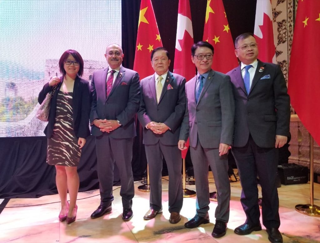 Solstice Public Affairs senior associate Karen Lin Woods with Ontario provincial parliamentarian Sheref Sabawy (second left), and Senator Victor Oh (centre), at a Chinese consular event celebrating Chinese National Day on October 1 in Toronto. Photo: Twitter/@KarenWenLin