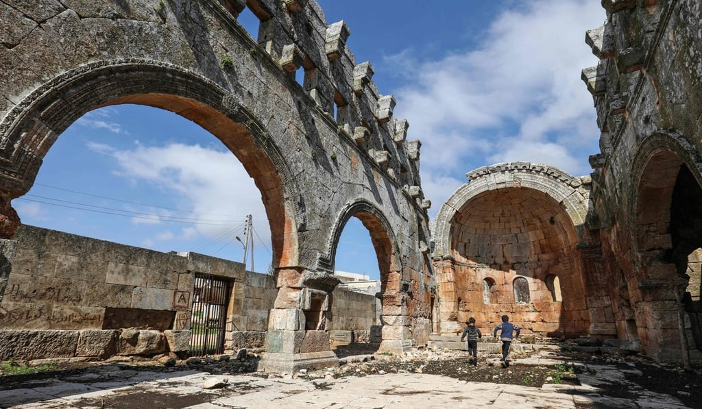 Children run in the central space of the ancient basilica in Qalb Lozeh village on Thursday. Photo: AFP Children run in the central space of the ancient basilica in Qalb Lozeh village on Thursday. Photo: AFP