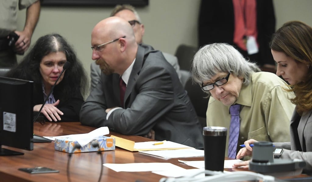 David Turpin (second from right) and Louise Turpin (left) at their sentencing hearing on Friday. Photo: AP David Turpin (second from right) and Louise Turpin (left) at their sentencing hearing on Friday. Photo: AP