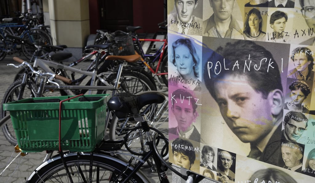 A poster showing director Roman Polanski on display outside the National Film School in Lodz, Poland in April. Photo: Bloomberg A poster showing director Roman Polanski on display outside the National Film School in Lodz, Poland in April. Photo: Bloomberg