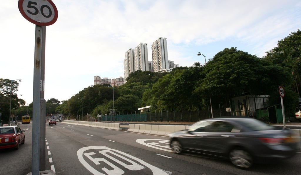 A car drives past a 50km per hour speed limit sign on Pok Fu Lam Road in September 2009. Photo:
