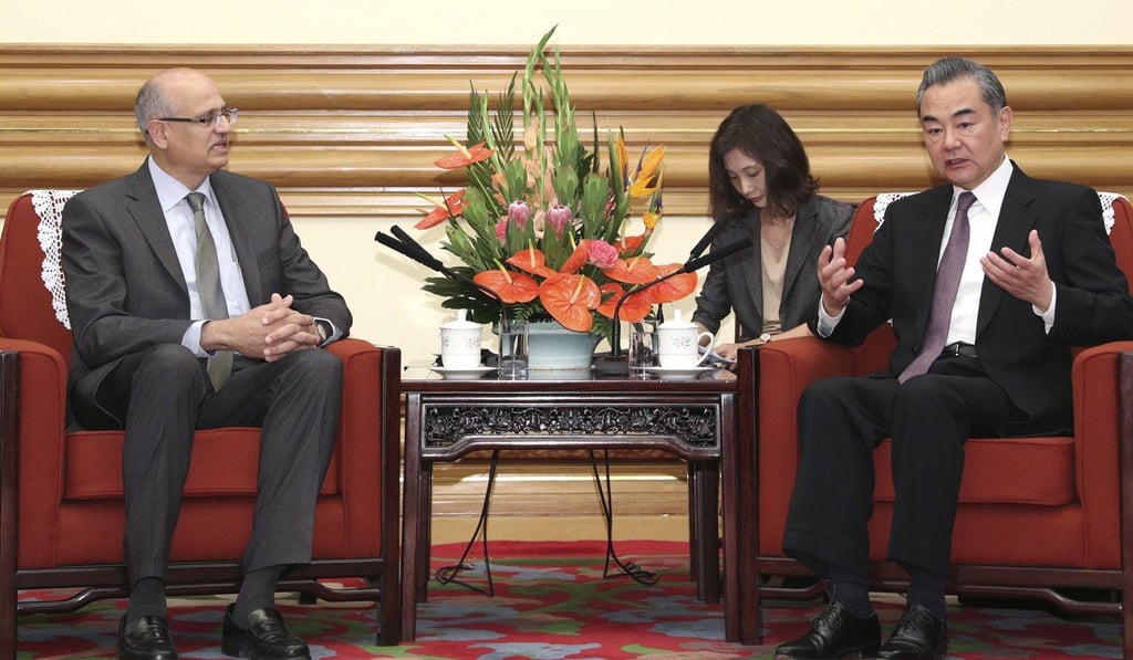 Vijay Keshav Gokhale listens to Wang Yi during their meeting at the Zhongnanhai leadership compound in Beijing. Photo: AP