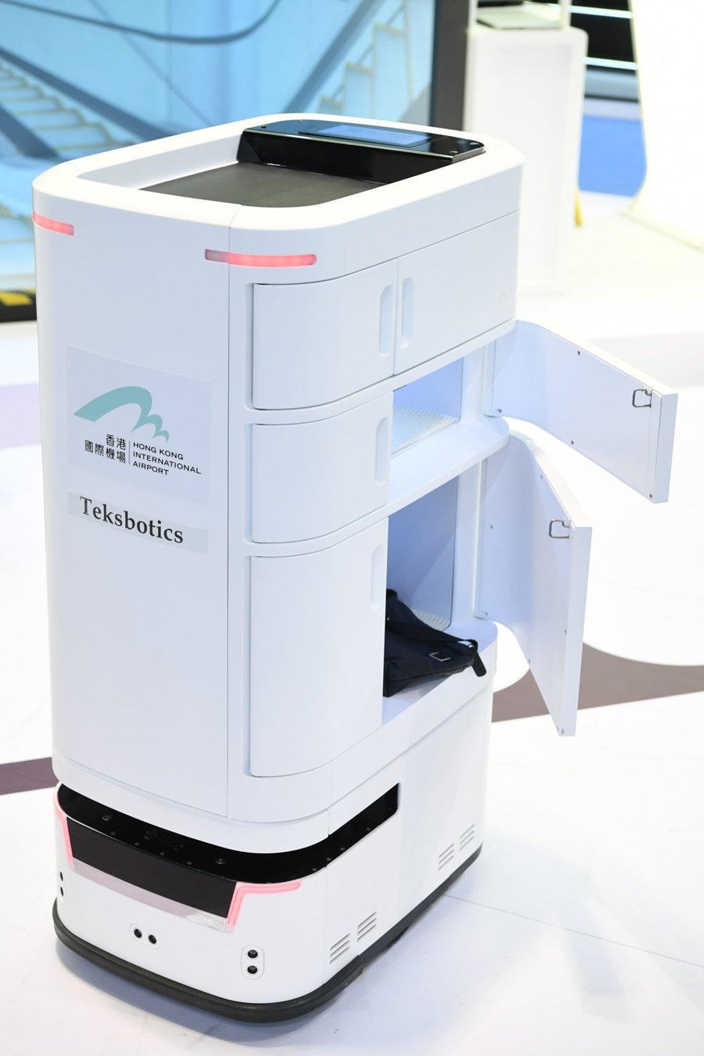 Delivery robots are being tested at Hong Kong International Airport to supplement the airport’s workforce