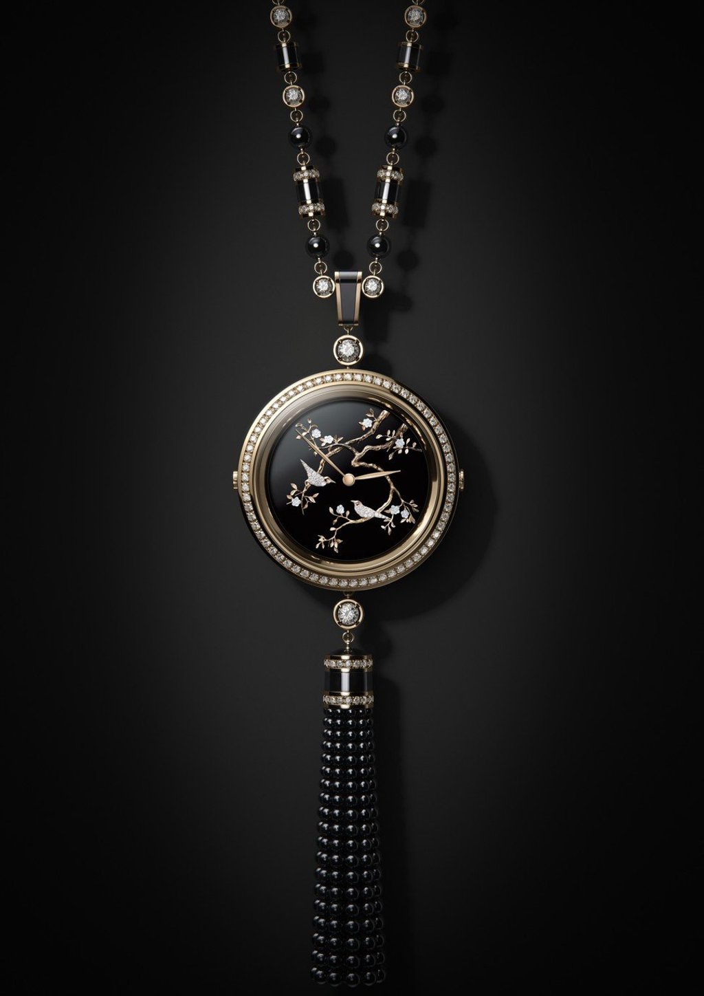 Chanel’s Mademoiselle Privé sautoir chain necklace features a sculpted 18-carat beige gold timepiece, with 50 brilliant-cut diamonds.