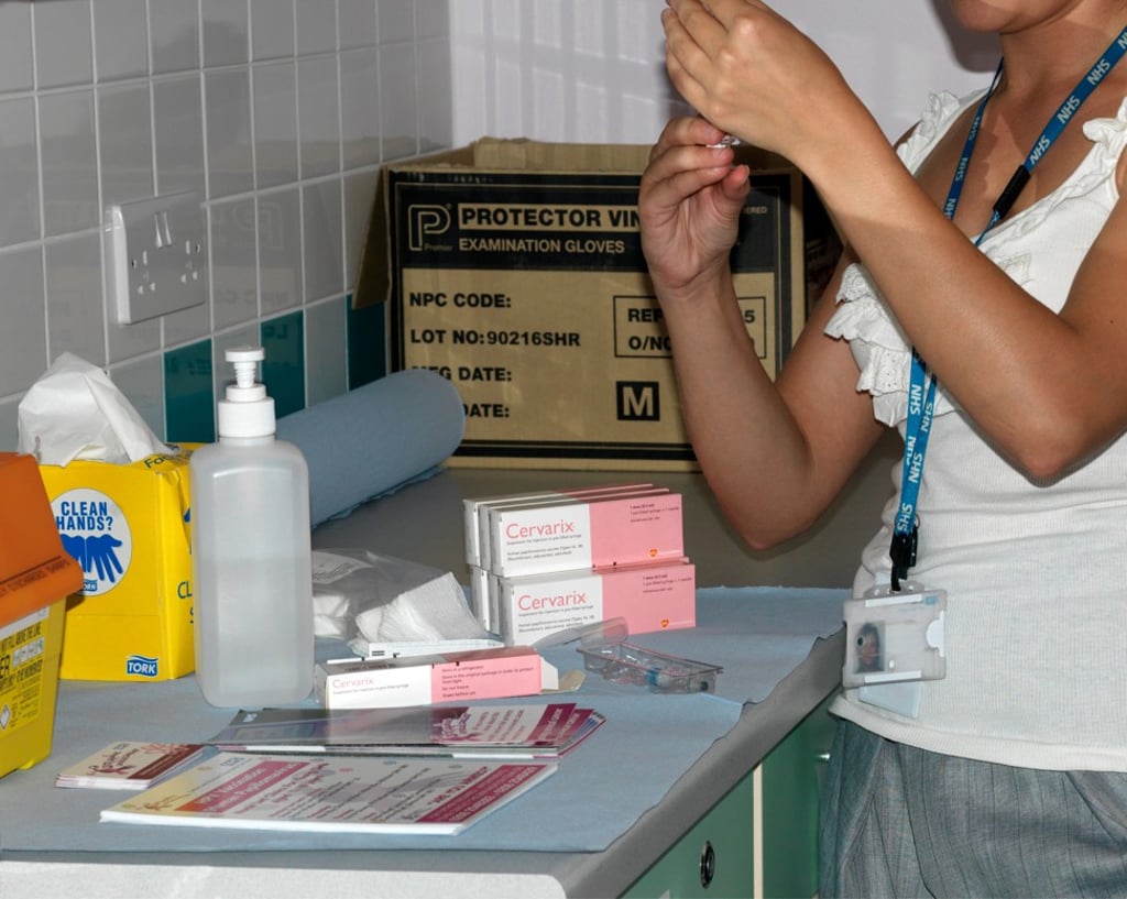 A nurse prepares a HPV injection to help protect against cervical cancer. Photo: Alamy A nurse prepares a HPV injection to help protect against cervical cancer. Photo: Alamy