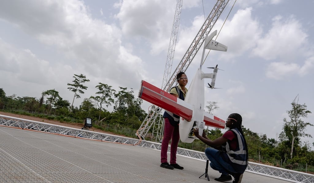Workers pack a box of vaccines to be delivered by a Zipline drone. Photo: Gavi/2019/Tony Noel via Reuters