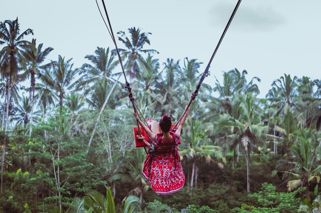 Why not take a picture swinging out over a rice field on a tropical island? There are only 91,000 photos already on Instagram with the #baliswing tag. Photo: Shutterstock