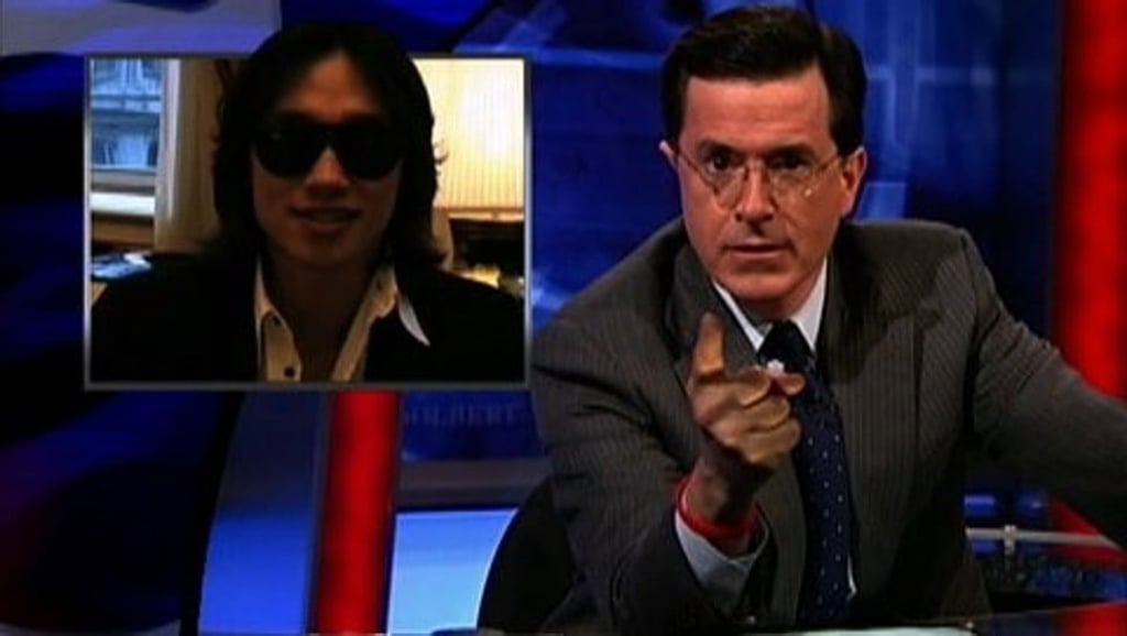 Rain (left) challenged TV host Stephen Colbert to a dance off. Photo: Comedy Central Rain (left) challenged TV host Stephen Colbert to a dance off. Photo: Comedy Central