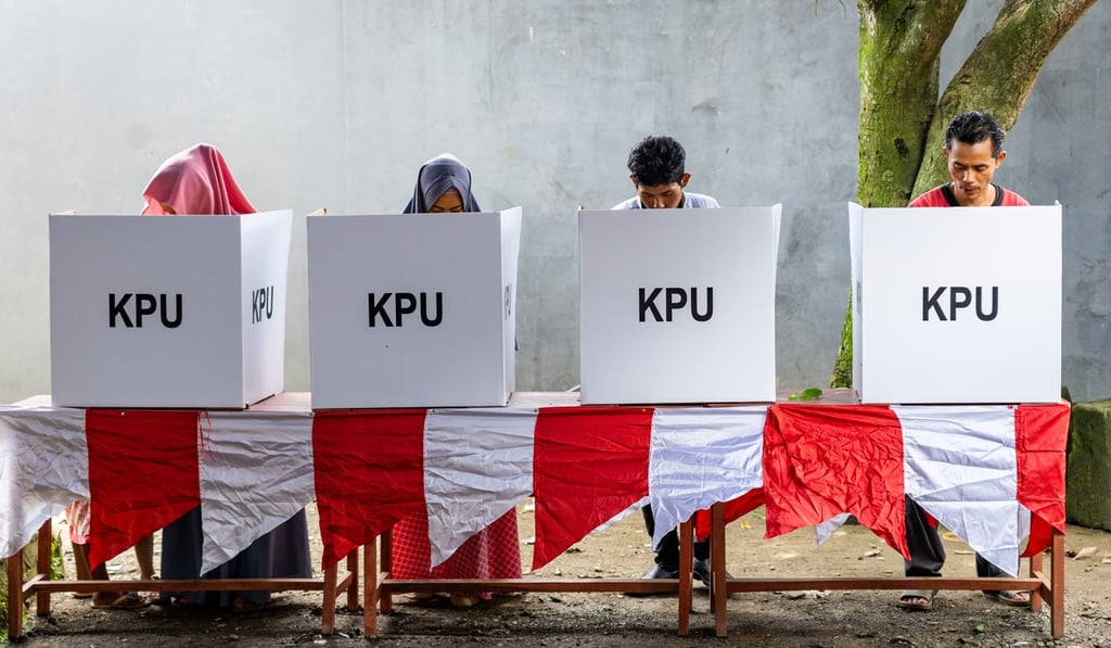 Voters cast their ballots at a polling station in West Java on April 17. Photo: Bloomberg