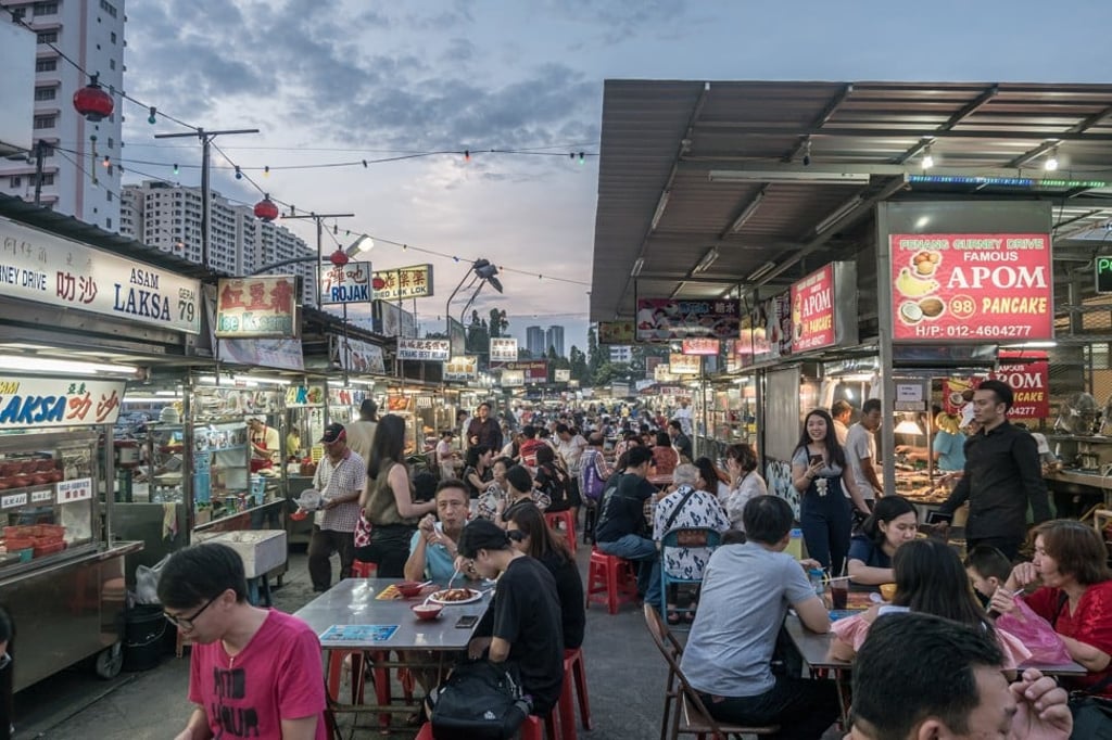 For atmosphere and a wide range of cuisines, you can't beat Penang's hawker centres – go hungry. Photo: Shutterstock For atmosphere and a wide range of cuisines, you can't beat Penang's hawker centres – go hungry. Photo: Shutterstock