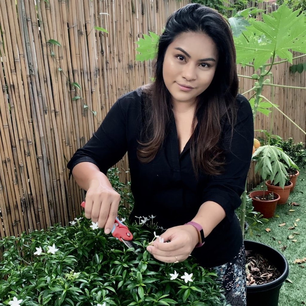 Tasneem Noor likes nothing better than getting her hands dirty in her Singapore garden.