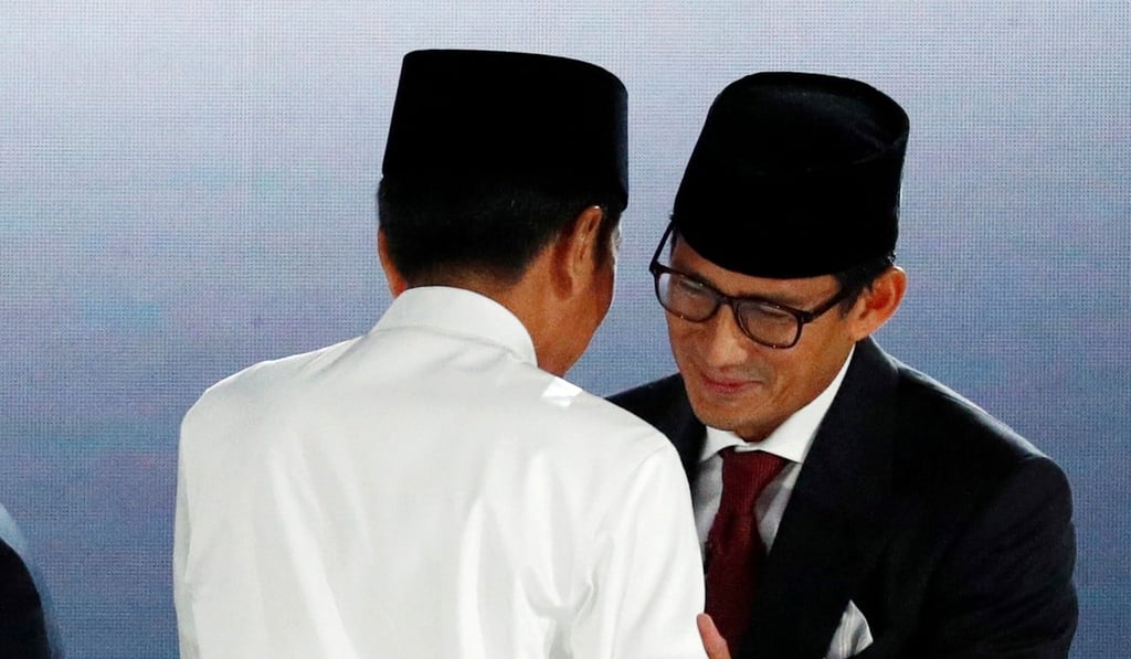 Indonesia's President Joko Widodo greets Sandiaga Uno before a debate in Jakarta on April 13. Photo: Reuters