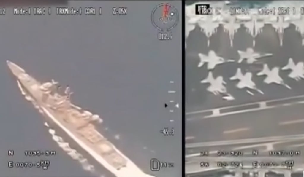 An image grab taken from undated footage aired by the Islamic Republic of Iran Broadcasting (IRIB) television on April 28, 2019, shows images allegedly taken by an Iranian Revolutionary Guards' drone flying over a US aircraft carrier at an undisclosed location. Photo: AFP
