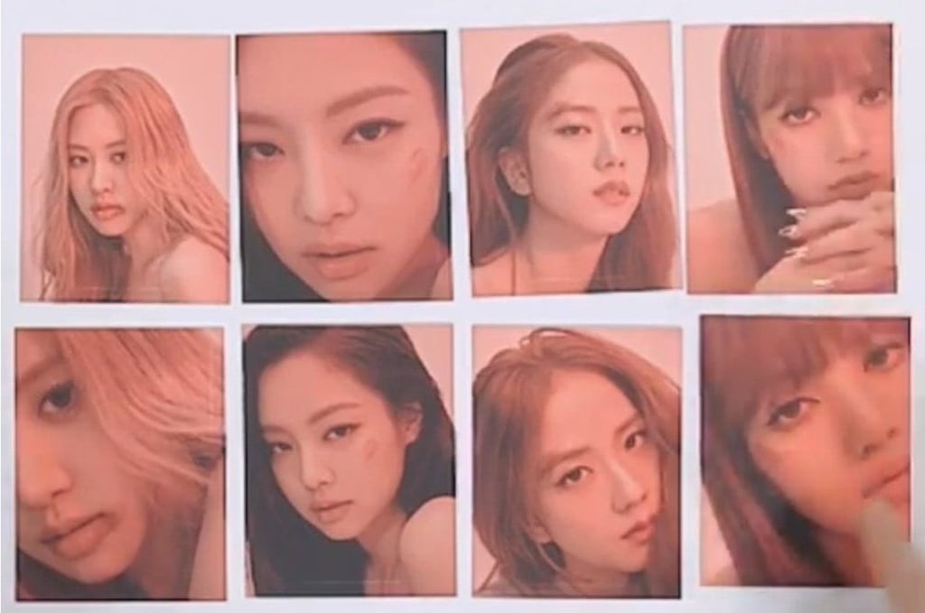 Photo cards with their latest album Kill This Love show Blackpink band members with bruises. Photo cards with their latest album Kill This Love show Blackpink band members with bruises.