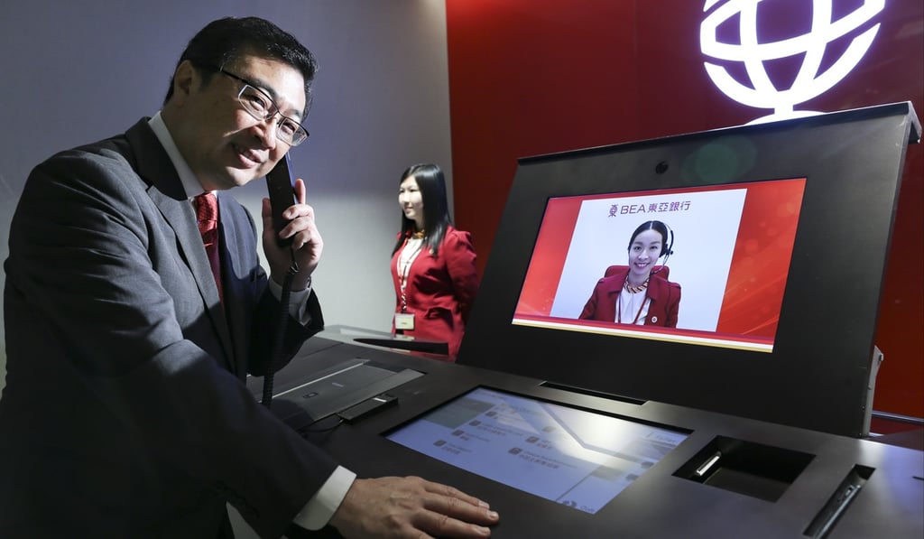 Vincent Hui, general manager and head of personal banking at Bank of East Asia, at the bank’s “innovation centre” at BEA Tower in Kwun Tong, where customers can interact with the bank’s digital services, in May 2017. Photo: Dickson Lee