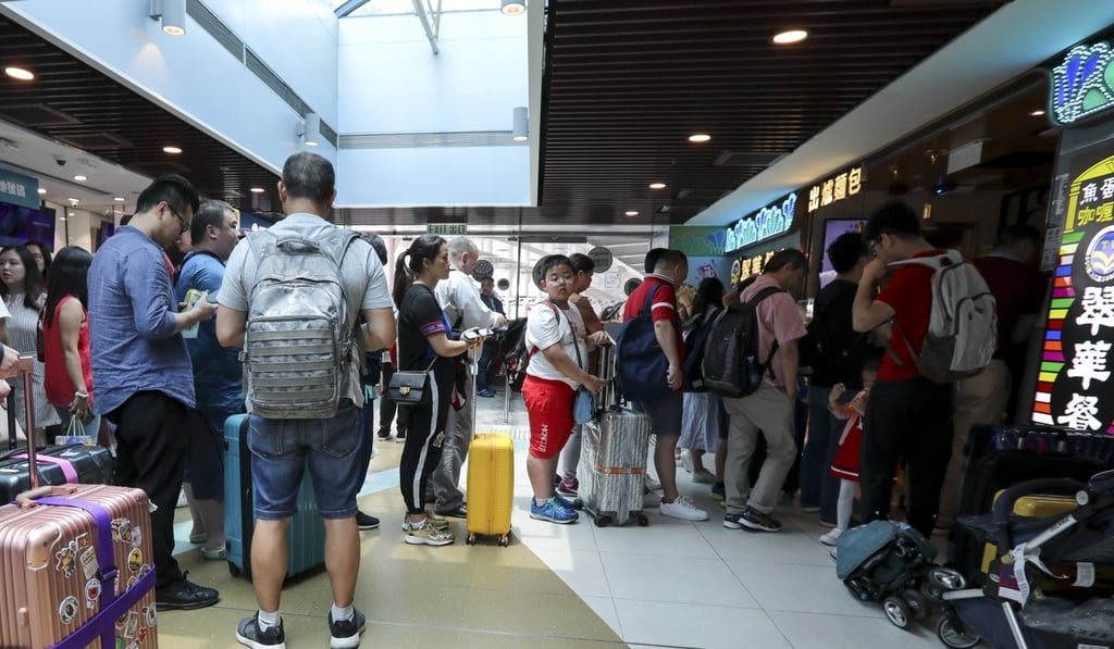 Mainland Chinese tourists shopping in Tung Chung on Wednesday. Photo: Felix Wong