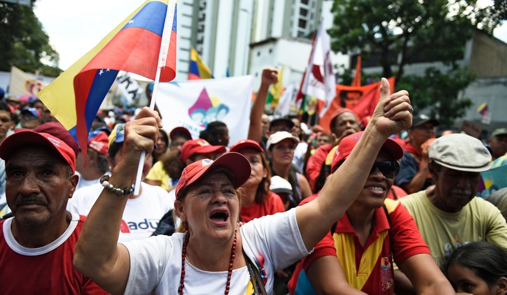 Supporters of Venezuelan President Nicolas Maduro rally in Caracas on April 6. Photo: AFP