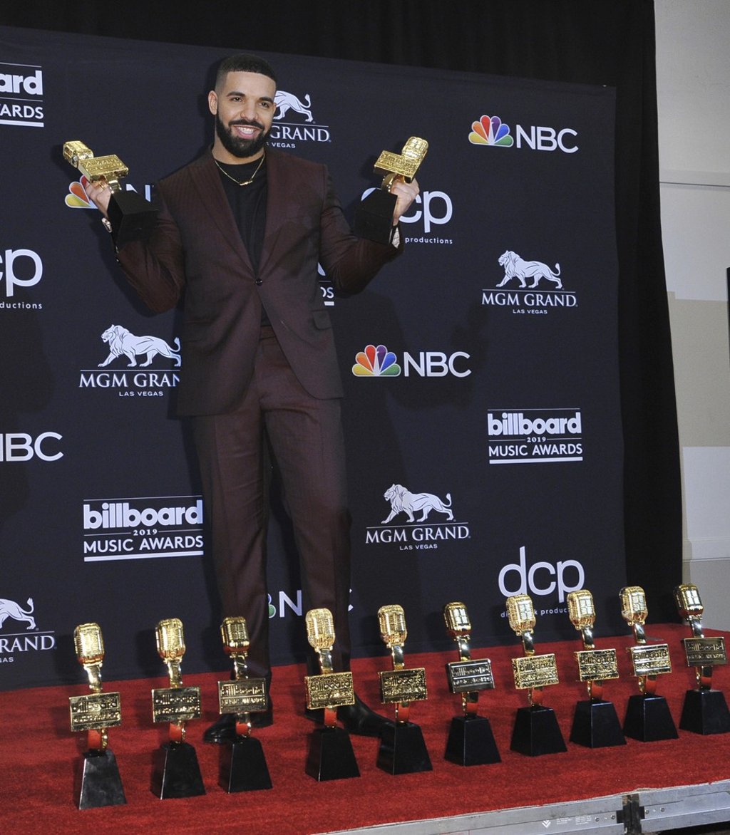 Drake poses in the press room with his awards at the 2019 Billboard Music Awards on May 1, at the MGM Grand Garden Arena in Las Vegas. Photo: Richard Shotwell / Invision / AP)