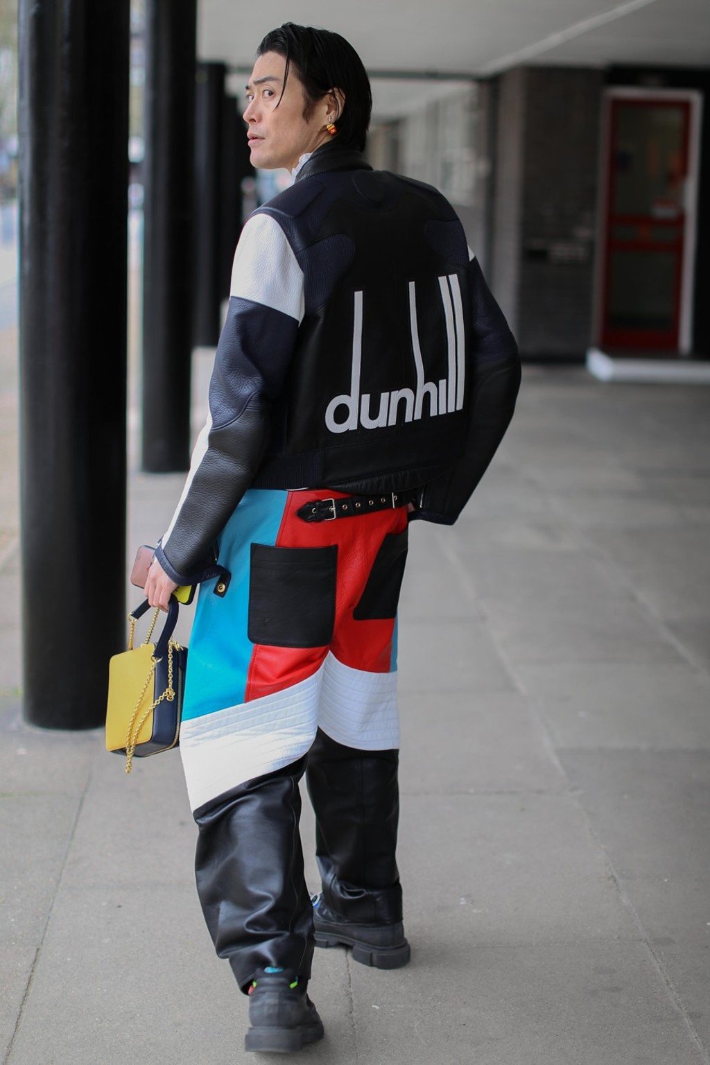 Masui wears a Dunhill leather jacket with a pirate shirt from Burberry, and Marques’ Almeida trousers. Trainers by Both Paris and a Mulberry bag. Photo: Thomas Serre