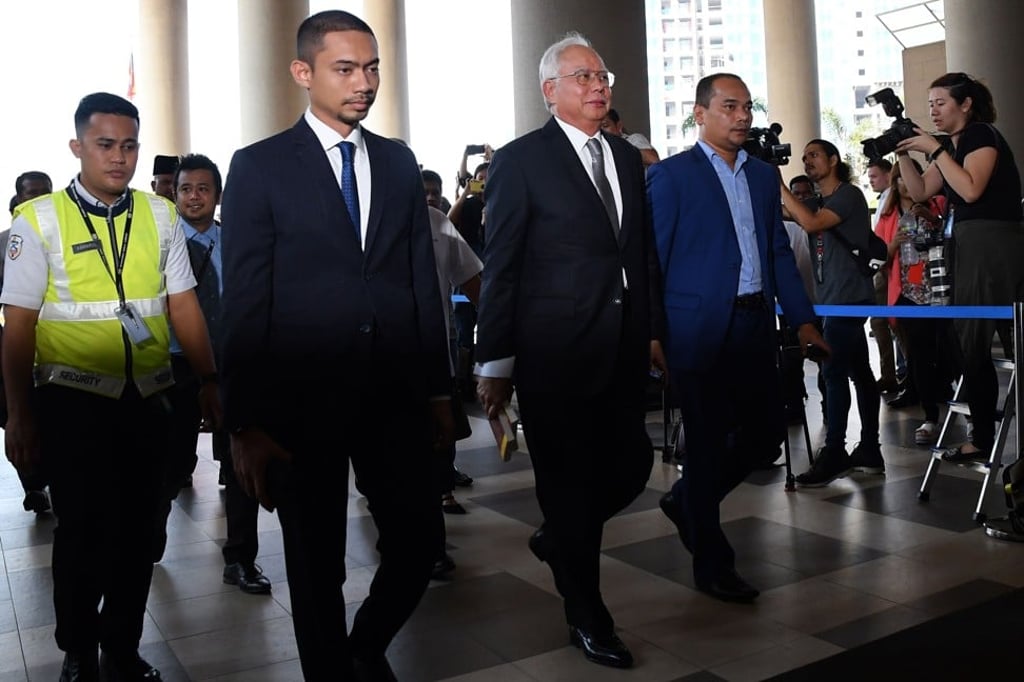 Malaysia's former prime minister Najib Razak arrives at the Kuala Lumpur High Court for his trial over 1MDB corruption allegations in Kuala Lumpur on April 15, 2019. Photo: STR/ AFP