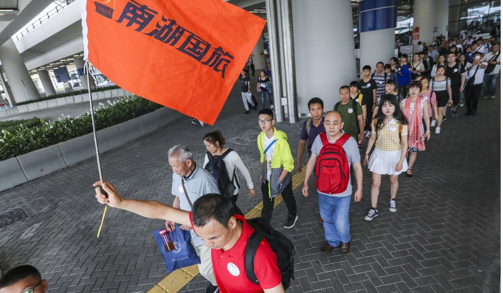 Mainland tourists on a shopping trip on the first day of the holiday. Photo: Felix Wong