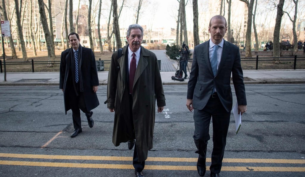 James Cole (centre) and other members of Huawei’s legal team arrive for a hearing in New York in March. Photo: AFP