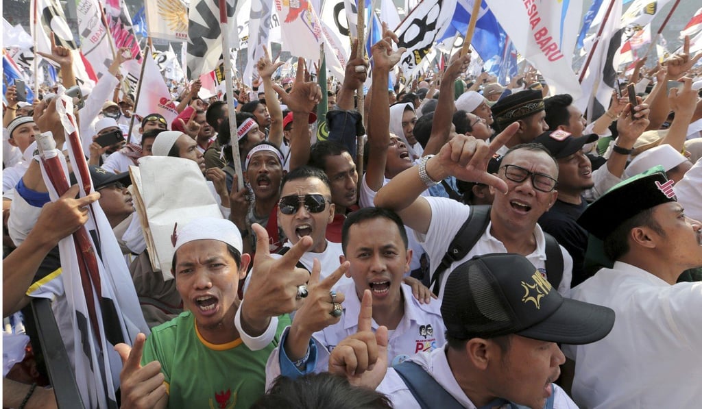 Supporters of Indonesian presidential candidate Prabowo Subianto’s Great Indonesia Movement Party shout slogans during a campaign rally. Photo: AP
