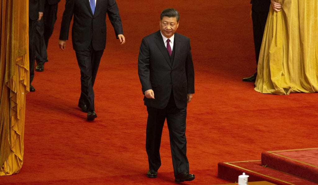 President Xi Jinping gets ready for a speech marking the centenary in the Great Hall of the People in Beijing on Tuesday. Photo: AP