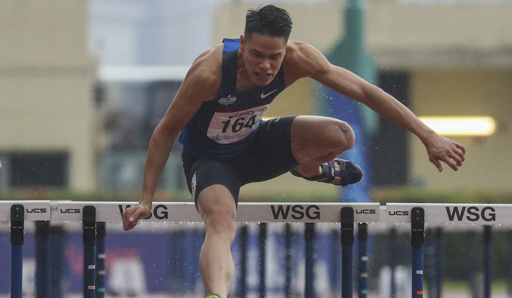 Chan Chung-wang races to victory in the men’s 110m hurdles.