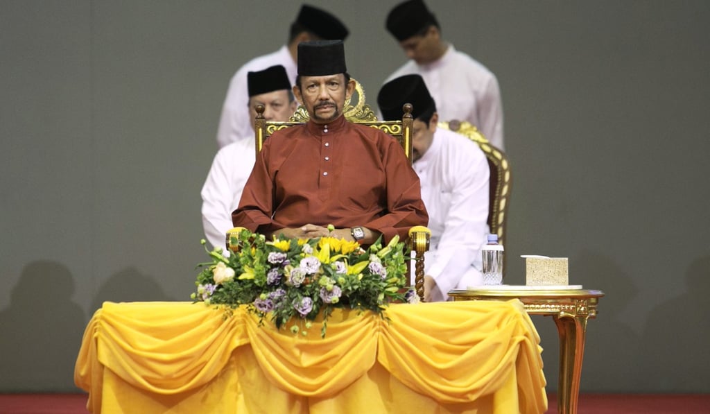Sultan of Brunei Hassanal Bolkiah speaks at the International Convention Centre to celebrate the Islamic event Isra Mi'raj. Photo: EPA
