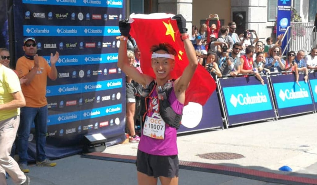 Jia Erenjia celebrates winning the OCC at UTMB. Photo: Pavel Toropov