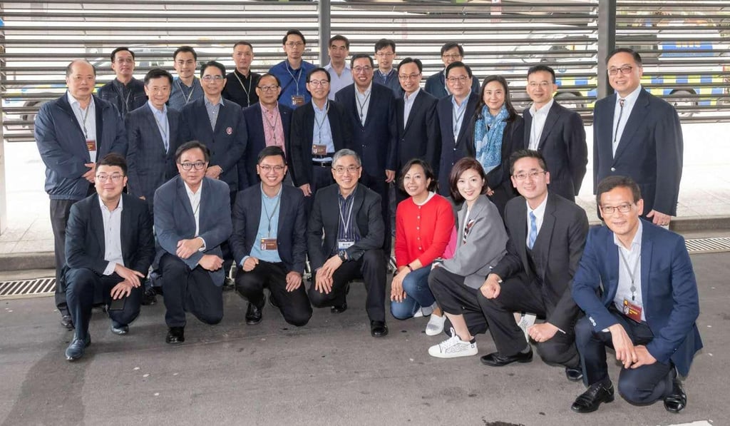 Pro-establishment lawmakers and officials pose for a picture before heading on their trip. Photo: Handout