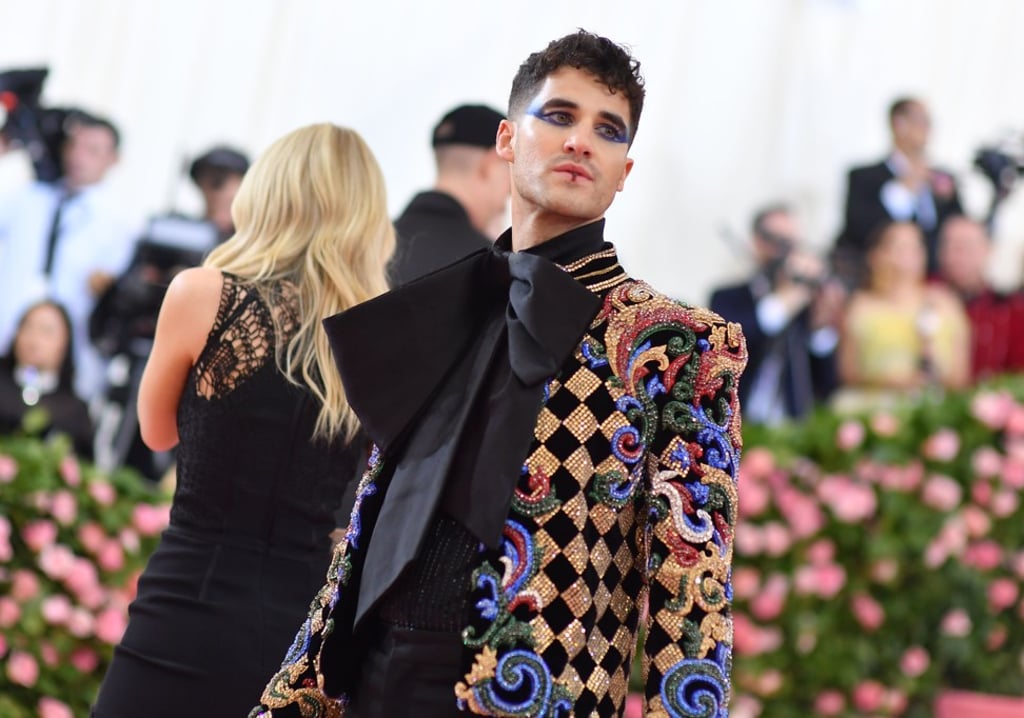 Actor Darren Criss, wore a Balmain jacket and make-up to match. Photo: AFP