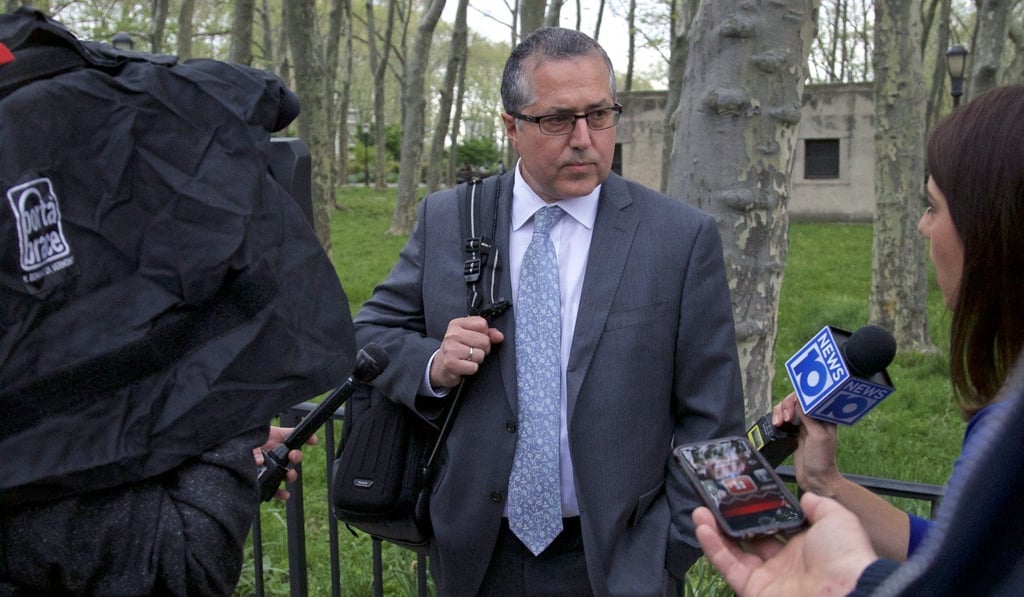 Marc Agnifilo, lawyer for former Goldman Sachs banker Roger Ng, speaks to the media while exiting from federal court on Monday. Photo: Bloomberg Marc Agnifilo, lawyer for former Goldman Sachs banker Roger Ng, speaks to the media while exiting from federal court on Monday. Photo: Bloomberg