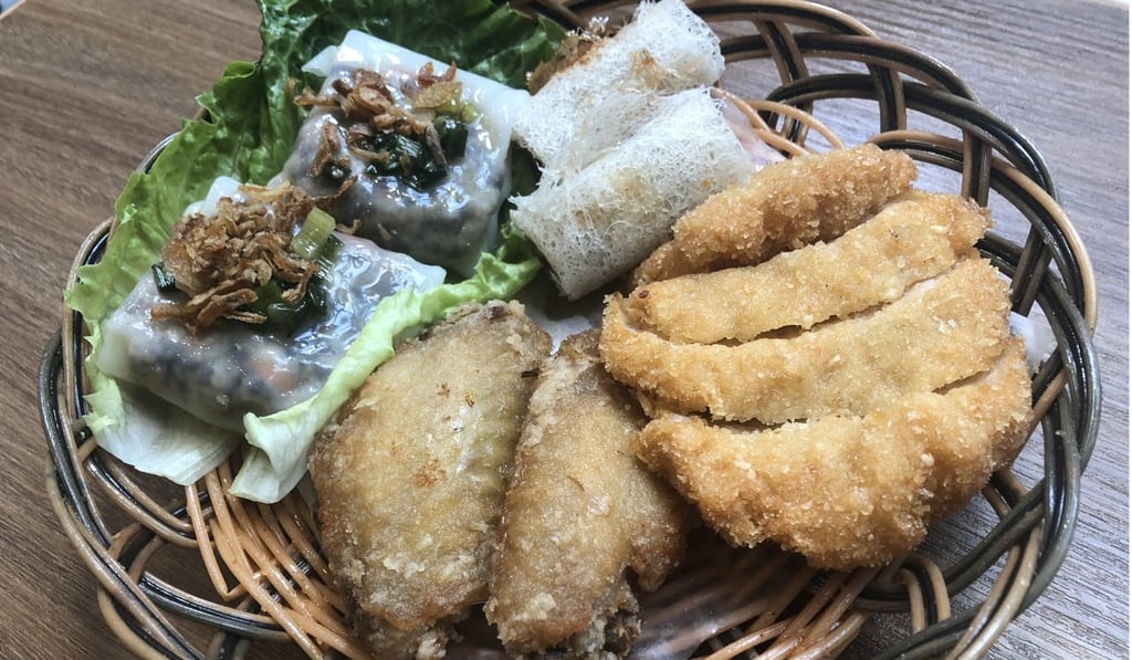 An assorted platter of spring rolls, shrimp cakes, chicken wings and steamed pancake rolls. Photo: Jane Zhang