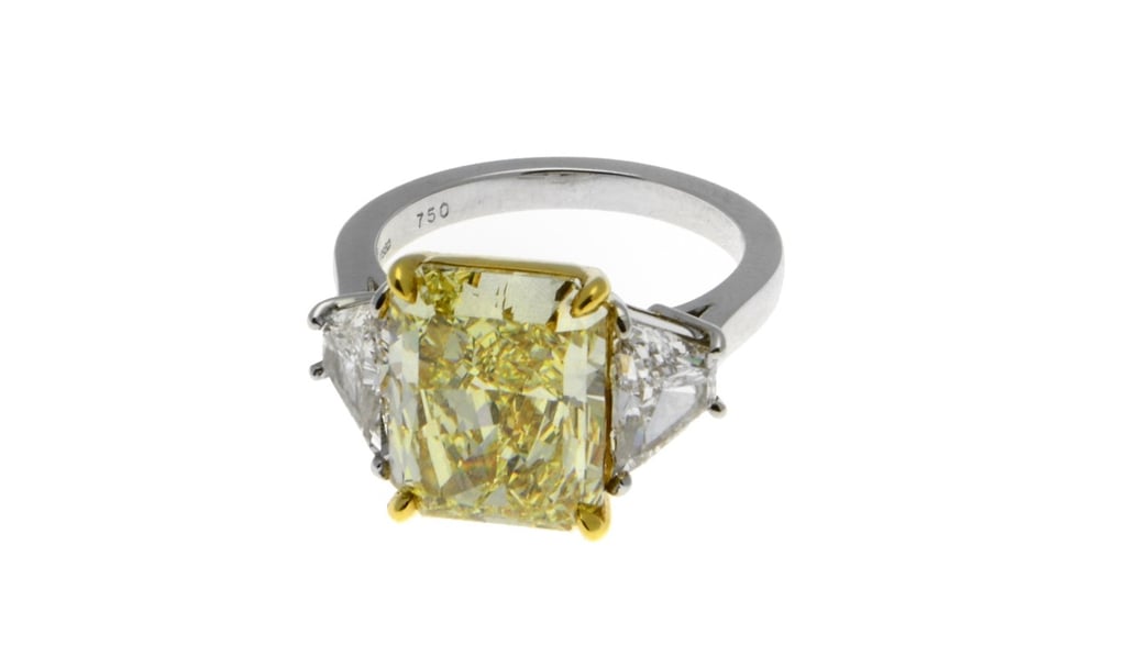 A 6.02 ct yellow diamond ring from Bulgari A 6.02 ct yellow diamond ring from Bulgari