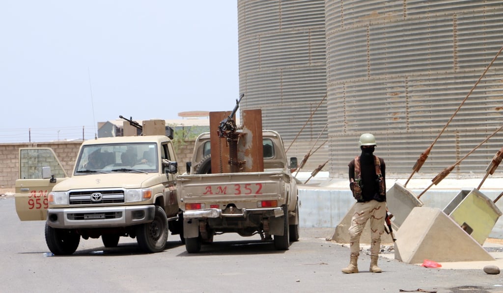 Yemeni pro-government forces guard as a team of the UN and the World Food Program visits the key grain storage silos in the war-torn city of Hodeidah, Yemen. Photo: EPA-EFE