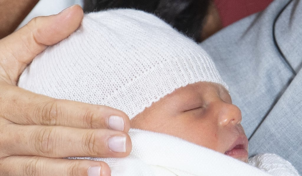 Britain's Prince Harry and Meghan, Duchess of Sussex, during a photocall with their newborn son, in St George's Hall at Windsor Castle, Windsor. Photo: Pool via AP Britain's Prince Harry and Meghan, Duchess of Sussex, during a photocall with their newborn son, in St George's Hall at Windsor Castle, Windsor. Photo: Pool via AP