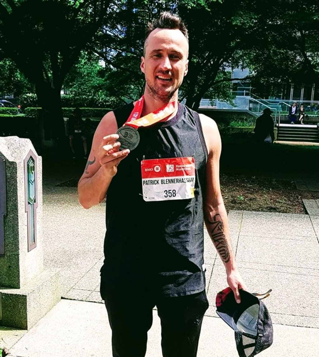 Patrick Blennerhassett after finishing a marathon in Vancouver, in which a smile hides a failed goal. Photo: submitted