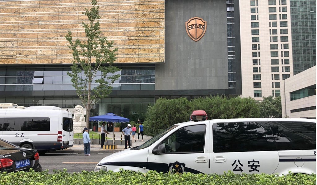 Regulators like the China Banking Regulatory Commission have stepped up oversight of problematic finance companies, but problems still persist. Photo: Simon Song
