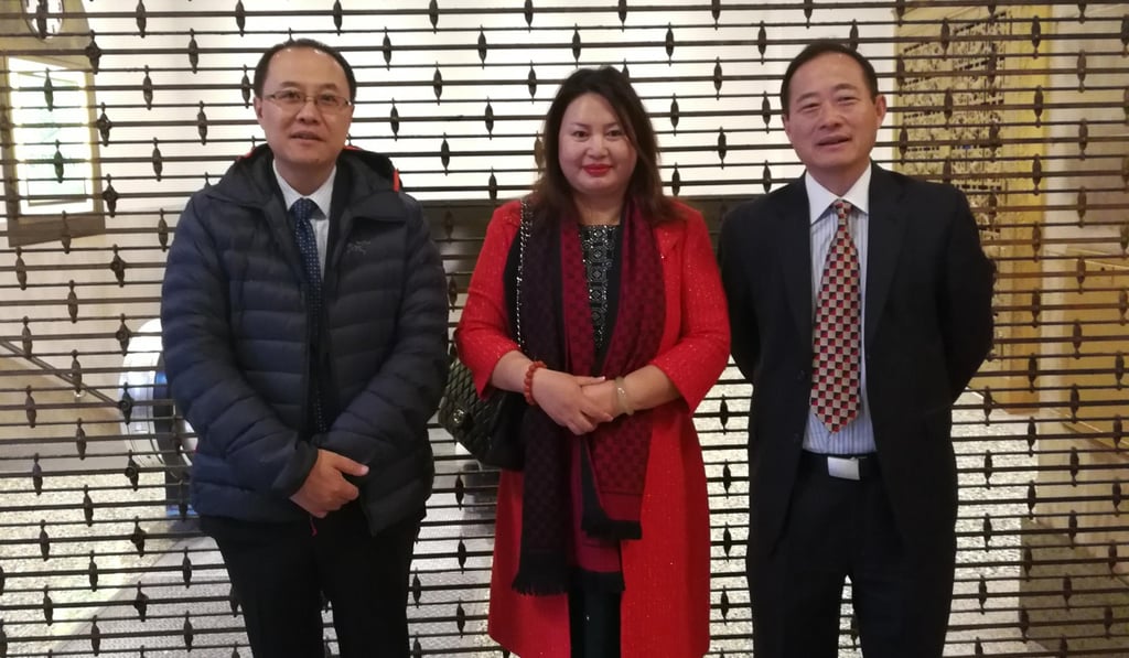Cindy Yang (centre) with tech executive Lucas Lu (left) and Cliff Li at a December 2017 fundraiser for Donald Trump. Photo: handout