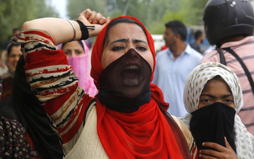 A protester shouts slogans during a march on the outskirts of Srinagar. Photo: EPA-EFE A protester shouts slogans during a march on the outskirts of Srinagar. Photo: EPA-EFE